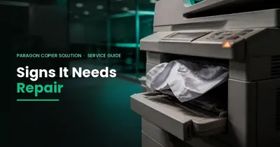 Office photocopier with a paper jam and warning light – signs your photocopier needs repair